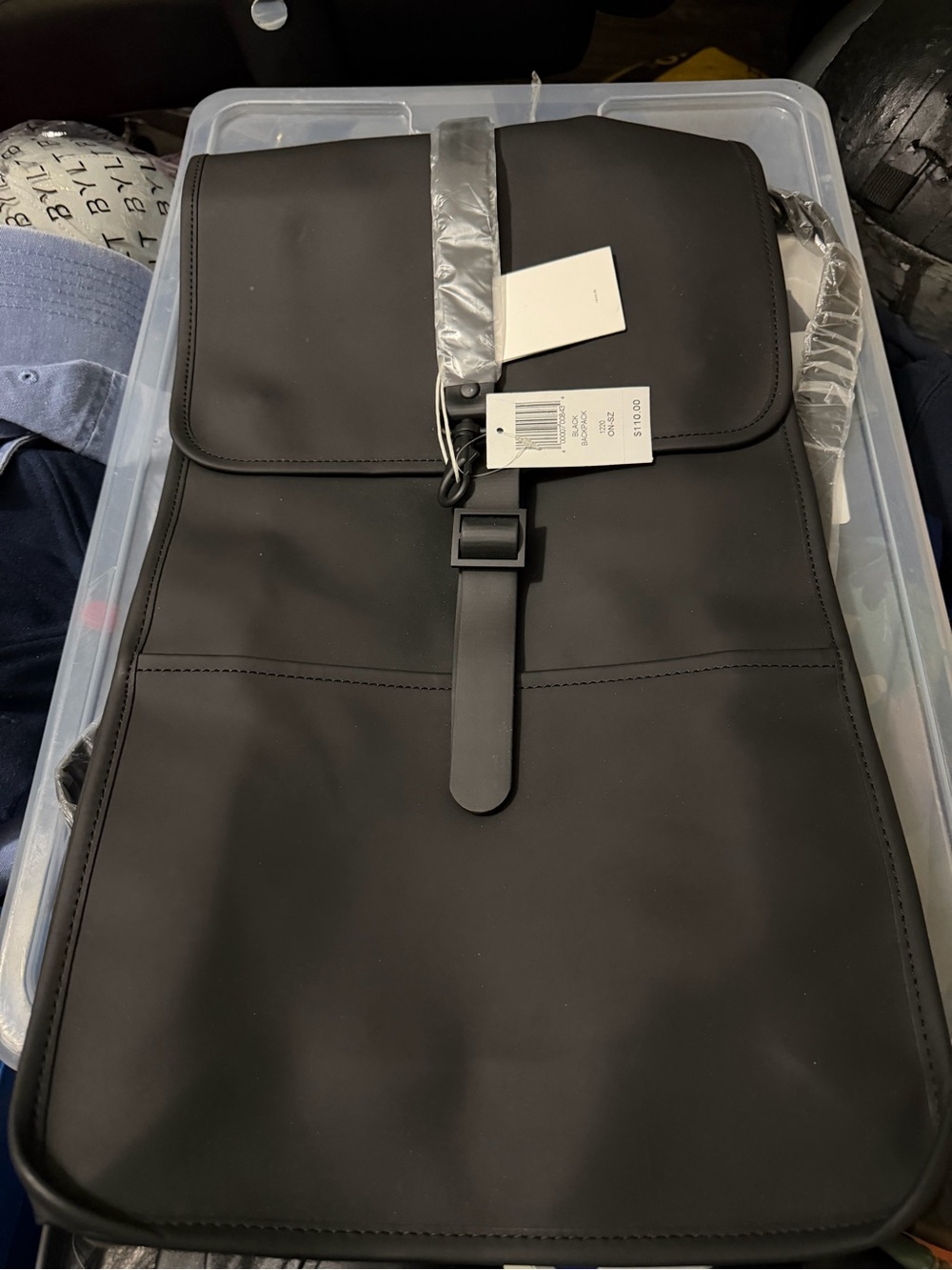 Rains Black Minimalist Roll-Top Backpack and duffle